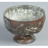 A Chinese bronze pedestal bowl decorated with dragons. (15cm diameter) Small hole to the base and