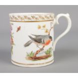 A late 18th/early 19th century cup with gilt borders and hand painted bird and floral decoration.
