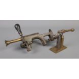 Antique cartridge reloading tools. Includes capper and reloading press.