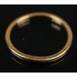 A small 22ct gold wedding band. Size H, 1.40g.