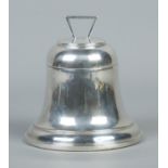 A silver bell shaped ink well with hinged cover and glass liner. Assayed Birmingham 1936. Height