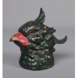 A cold painted bronze inkwell in the form of a bird head, marked "Austria" on base.