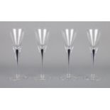 Orrefors - A set of four Intermezzo liqueur glasses, with blue stem. 15cm tall.