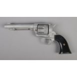 A replica model single action 45 revolver, model 1974. CAN NOT POST OVERSEAS. Crack to one panel