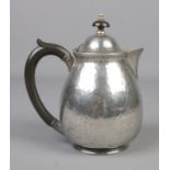 A Liberty and Co Tudric hammered pewter water jug