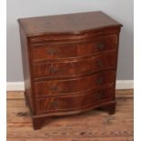 Modern serpentine fronted mahogany chest of four long drawers with brushing slide. Hx82cm Wx73cm