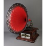 A concert hall gramophone featuring painted tinplate horn and Gramola soundbox. Possible