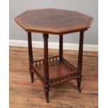 A Victorian rosewood window table with inlaid and crossbanded decoration.