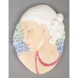 An Art Deco Beswick Ware wall plaque, Lady With Beads. Impressed number 436 and painter's number