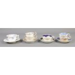 A collection of Rockingham porcelain tea wares. Includes cup and saucer with red griffin mark