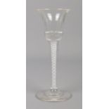 An early to mid 20th century air twist wine glass. Having ten strand air twist and bubble