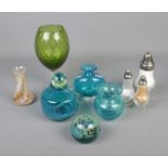 An assorted collection of Mdina glass and other glassware including salt pepper and sugar shakers.