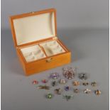 A collection of insect and spider brooches