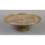 A late 19th century brass and copper tazza. With central panel depicting Temperantia, surrounded