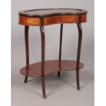 An early 20th century mahogany kidney shaped bijouterie cabinet. Having floral inlaid border and