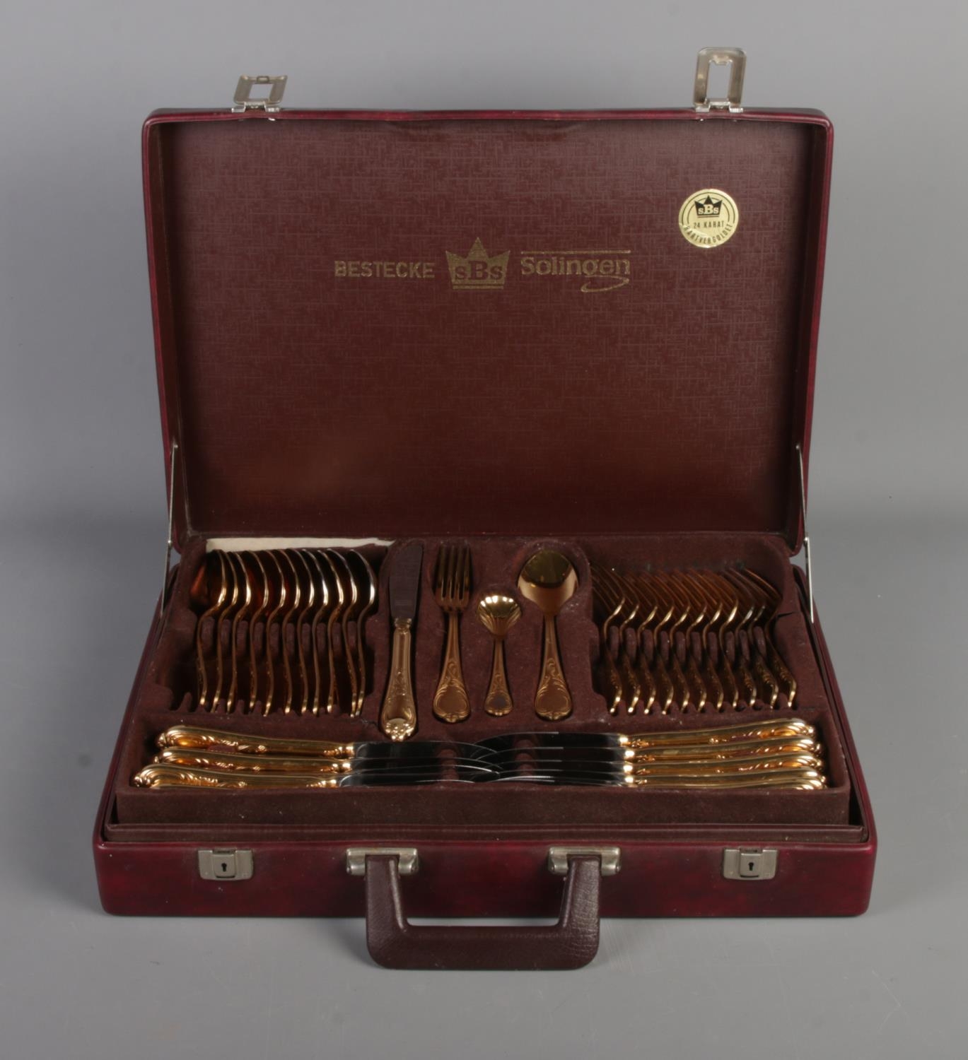 Cased Bestecke Solingen gold plated cutlery canteen