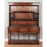 A Titchmarsh & Goodwin oak dresser.