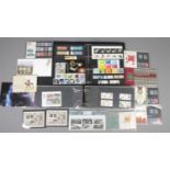 A quantity of British mint stamps and first day covers. Includes Harry Potter, Commemorative, etc.