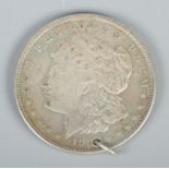 A 1920 United States of America one dollar coin.