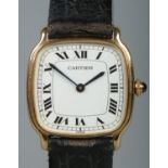 An 18ct gold Cartier manual wristwatch. Having Roman numeral markers. With leather strap and 18ct