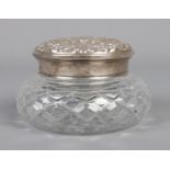 A silver topped Brierley glass jar, with mirror to the inside of the lid. Assayed for Birmingham,