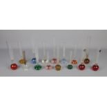 A collection of 15 controlled bubble bud vases in various colours and sizes.
