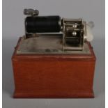 A wax cylinder phonograph stamped 30229 with mahogany case. Includes Soprano, Wearing of the Green