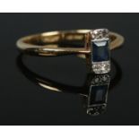 An 18ct gold, platinum, sapphire and diamond ring. Size P 1/2. 2.59g.