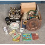 Two boxes of miscellaneous to include metalwares, children's games, ceramics, stoneware, etc.