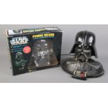 A Darth Vader telephone along with a boxed Darth Vader Power Talker voice changing mask.