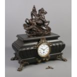 A large mantel clock surmounted with a bronze sculpture depicting St George and the dragon and
