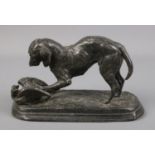 A cast spelter figure of a hunting dog with duck. 16cm long