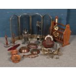A box of wooden and metalwares to include fireplace accessories, brass decorative pieces and