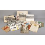 A quantity of vintage photos and military ephemera, to include training notebook, part filled