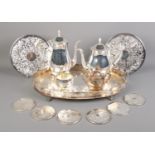 A four piece silver plated tea set, together with gallery tray, placemats and coasters. Tray stamped