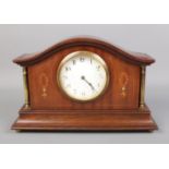 A Buren mantel clock featuring mother of pearl inlaid decoration. In working order.