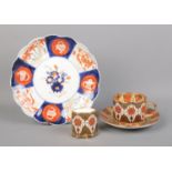 Three pieces of Derbyshire Burtondale ceramics, in the Imari pattern, together with a small Japanese