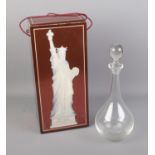 A boxed De Luze Grand Cognac decanter of the statue of liberty along with other glass Bartin &