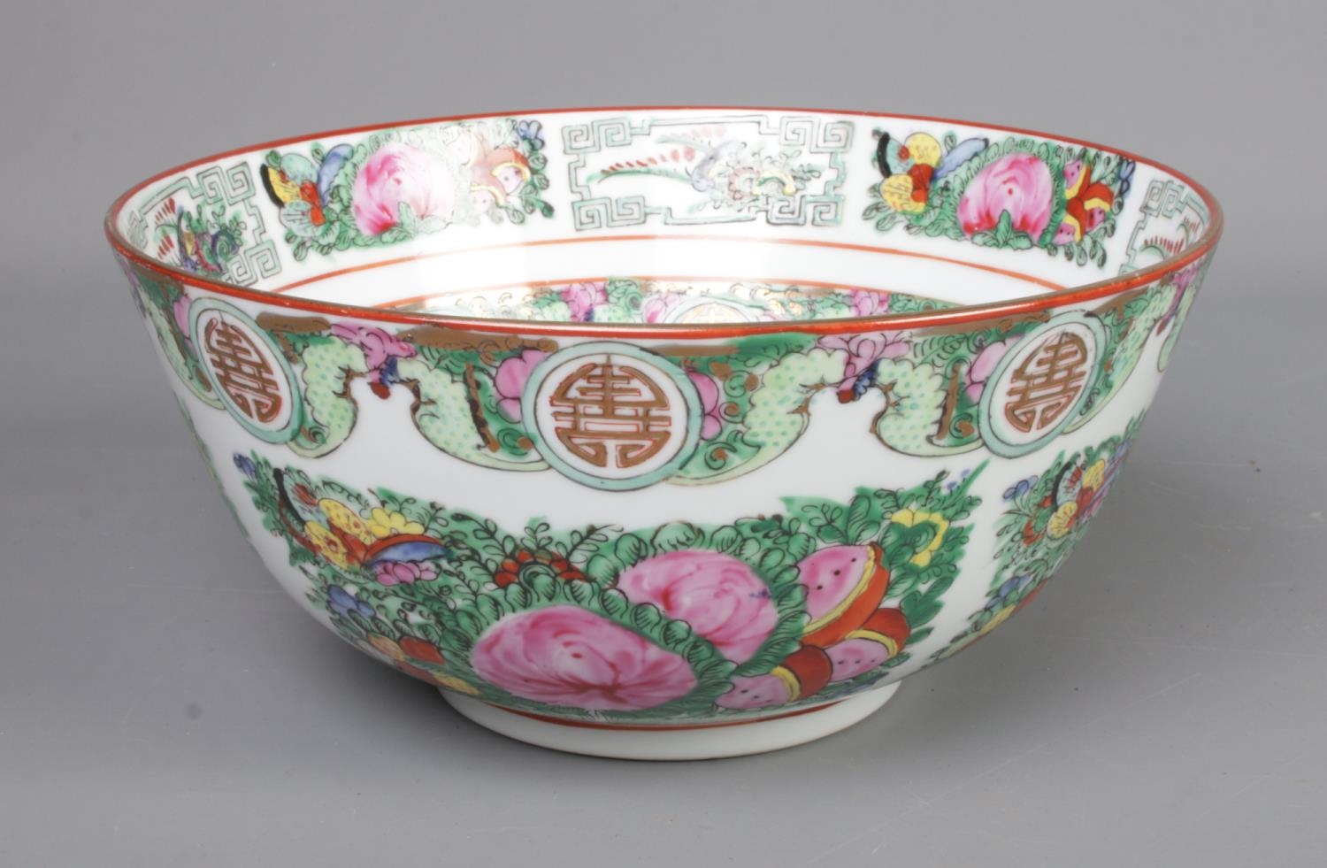 A Chinese famille rose bowl with reign marks. C1930/40 Four character mark to base, Made in Hong