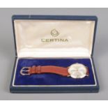 A Gents Certina Jubile 9ct Gold manual wind wristwatch, on brown leather strap. With presentation