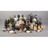 A large collection of assorted pottery and resin figures