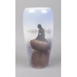 A Royal Copenhagen vase depicting The Little Mermaid statue. Stamped #4463 Langelinie to base.