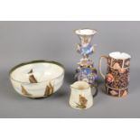 A collection of ceramics including Royal Doulton seriesware, Spode jug and Rockingham style vase.