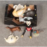 A box of miscellaneous to include wooden Mickey Mouse toy, quartz Tetley teapot clock, Beswick