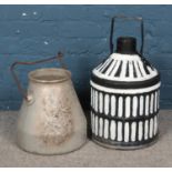 Two metal milk churns including one painted example.