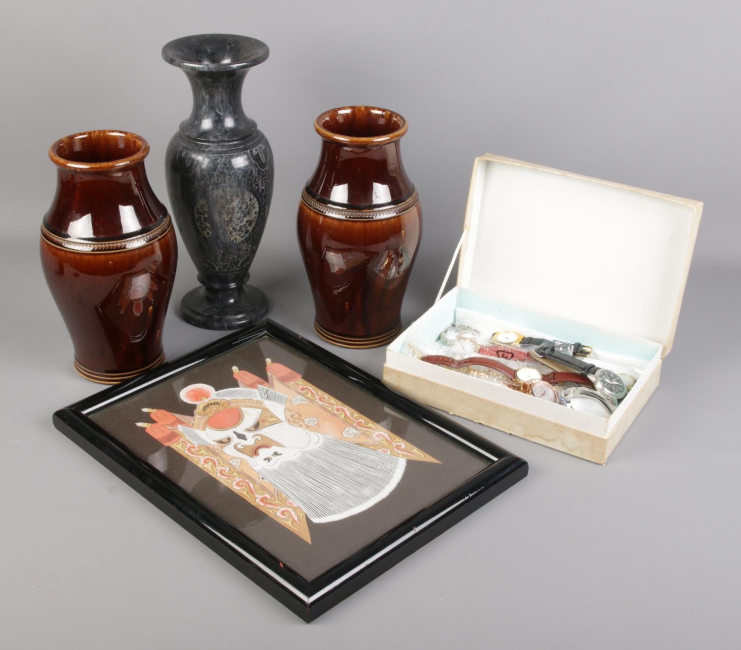 A quantity of assorted items. Includes marble vase, brown glazed vases, quartz wristwatches and a