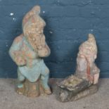 A pair of reconstituted stone paints gnomes tallest at 62cm
