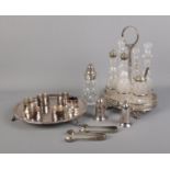 A collection of silver plate including Walker and Hall cruet complete cruet set along with napkin