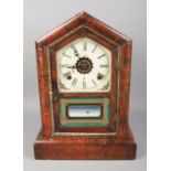 An antique Gilbert 'Cottage' mantel clock. In working order with pendulum and key.