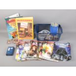 A quantity of film and tv collectables including Yu-Gi-Oh! cards, Doctor Who Battles in Time